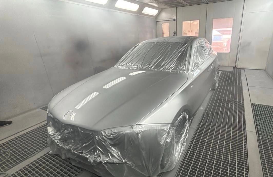 A sedan being resprayed at Mobile Dent Pro