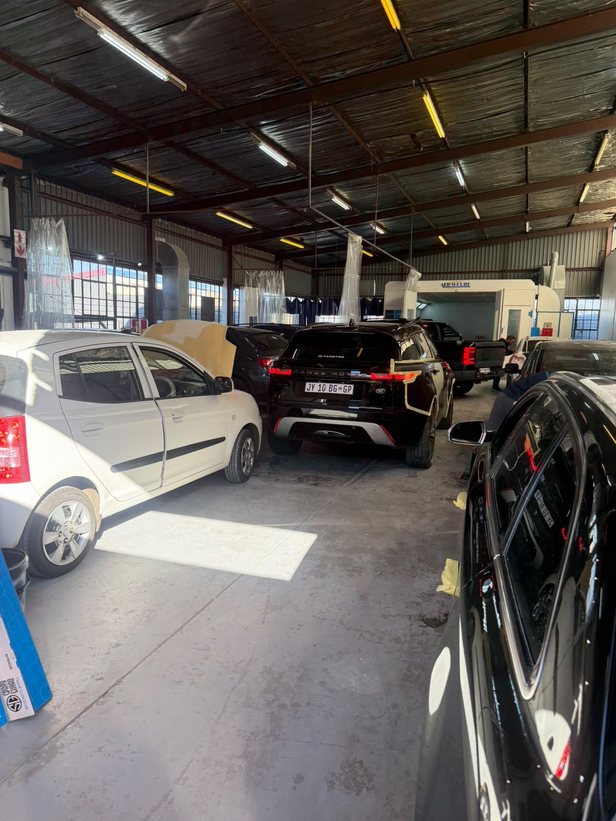 Cars being repaired at the Mobile Dent Pro workshop in Johannesburg